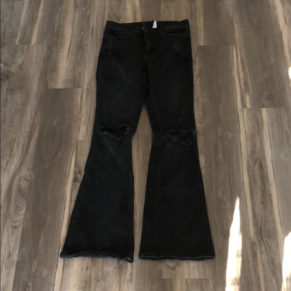 black midrise ripped flare jeans